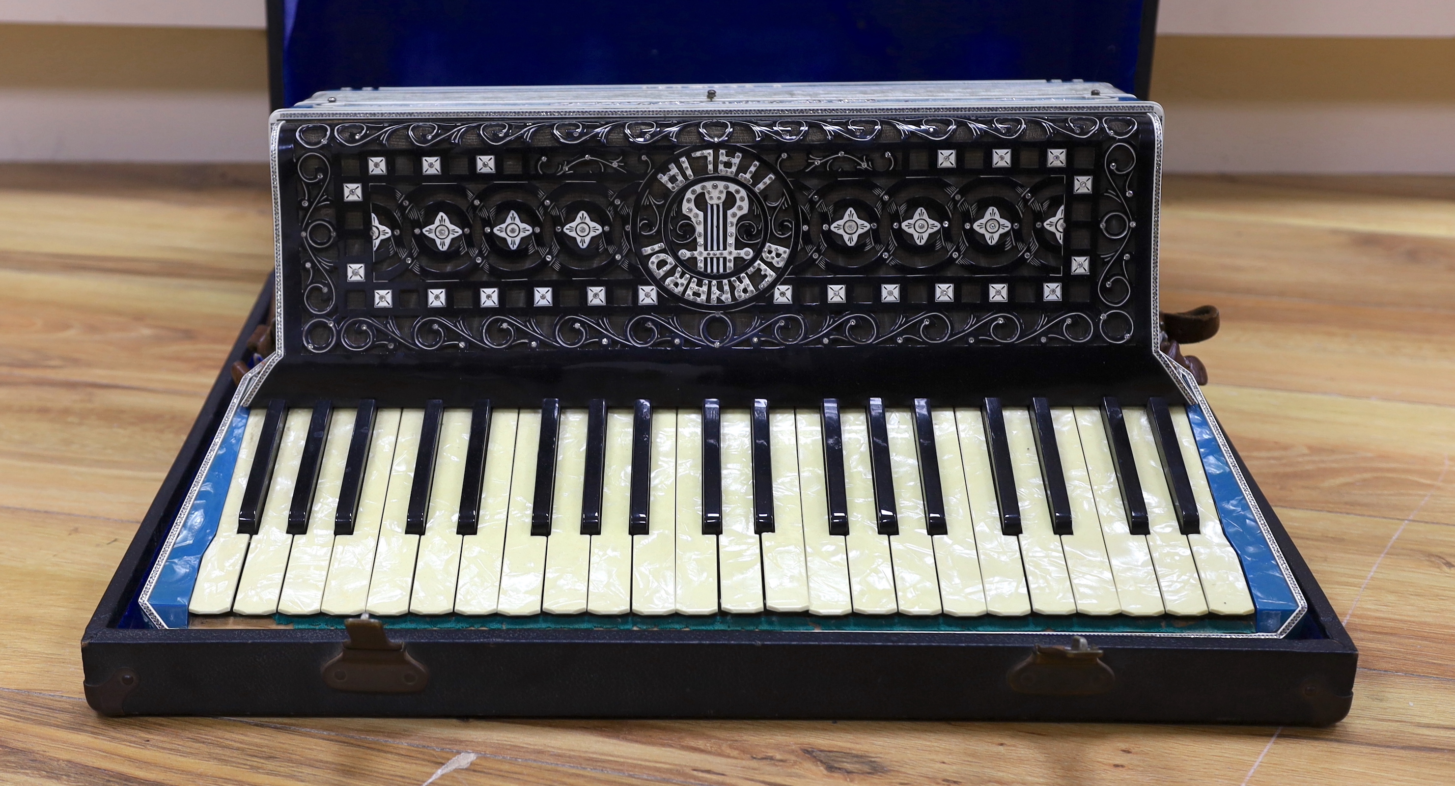 A cased Bernadi piano accordion